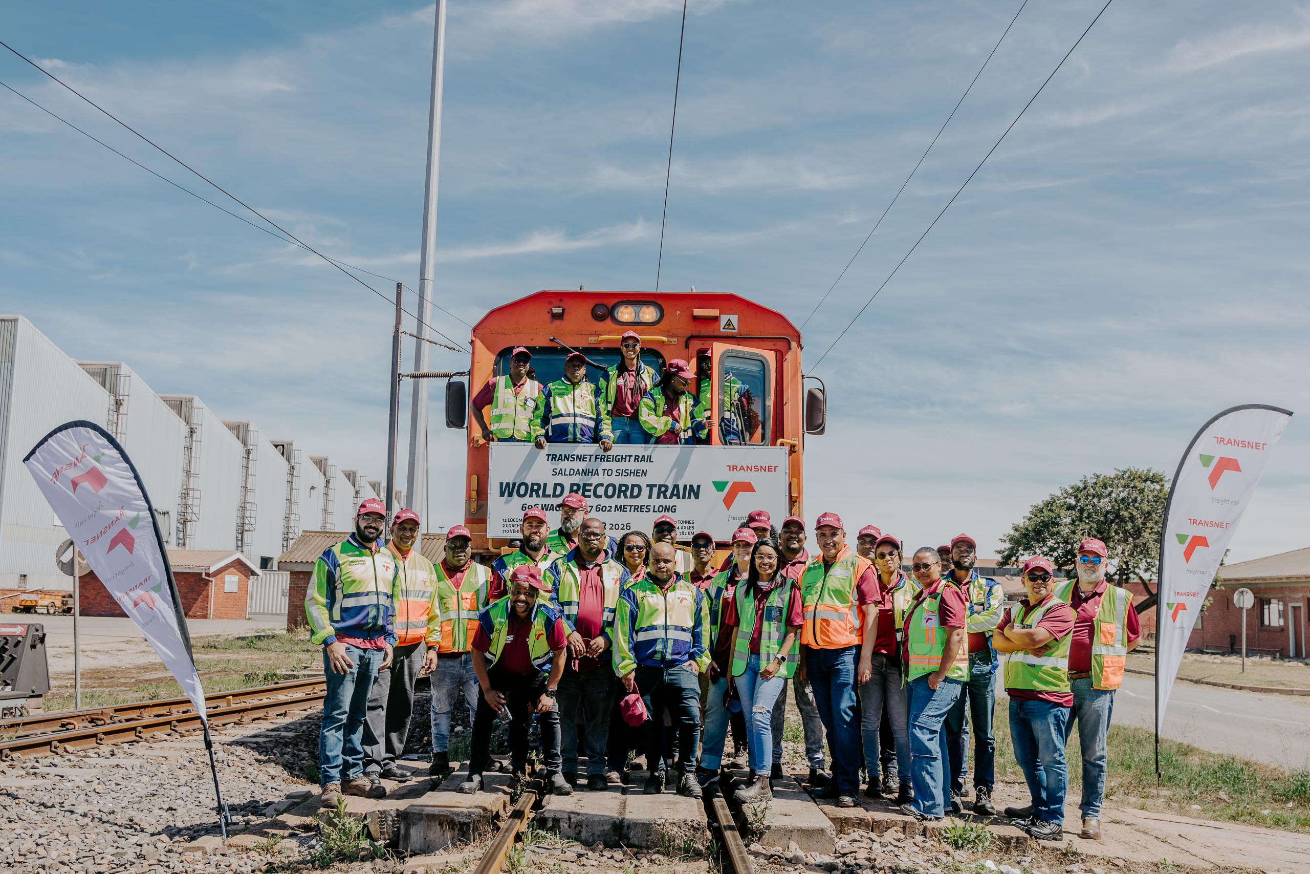Transnet Freight Rail team celebrating the world-record 696-wagon iron ore train